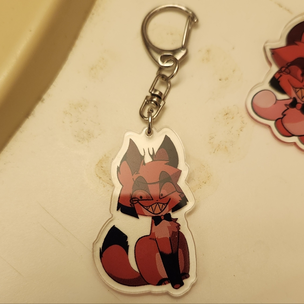 Hazbin Hotel Rosie and Alastor keychains